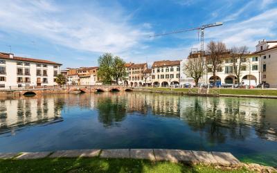 Cityscape of Treviso downtown with the river Sile with the street called Riviera Garibaldi