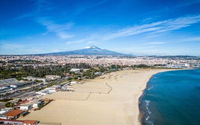 Beach in Catania, view of the Etna volcano